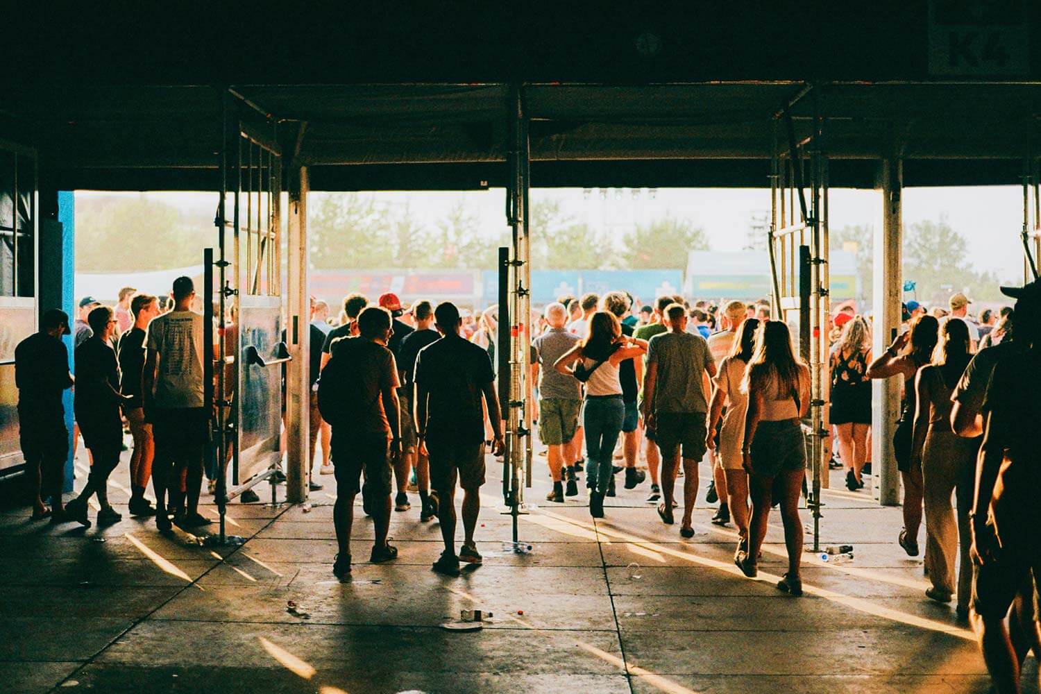 Crowd of people entering music festival stock photo
