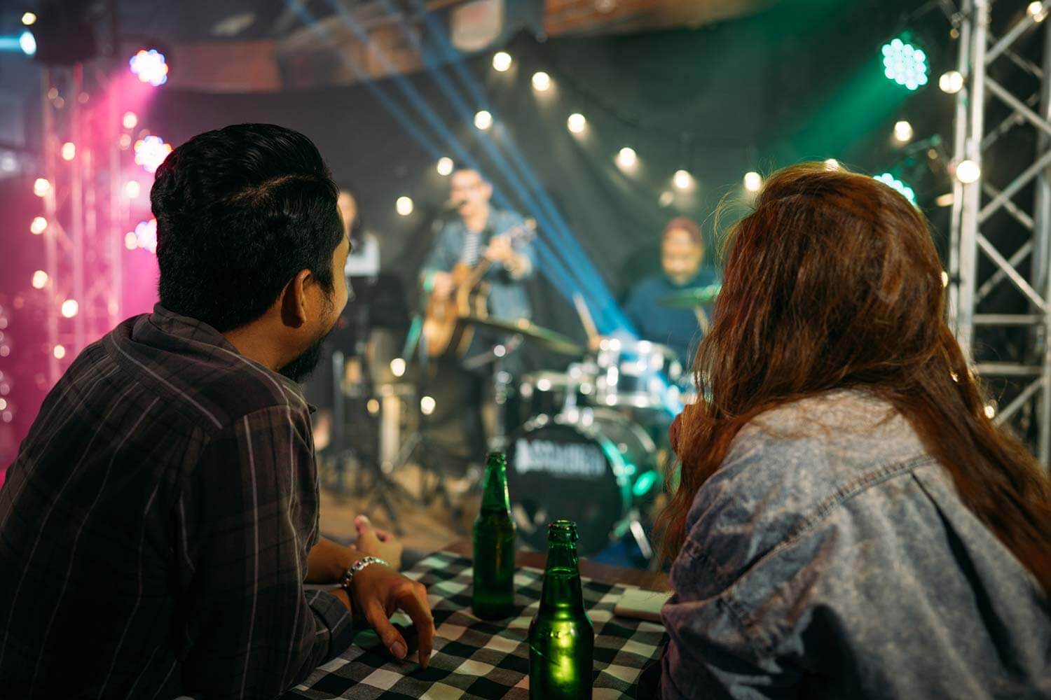 couple watching an intimate gig together