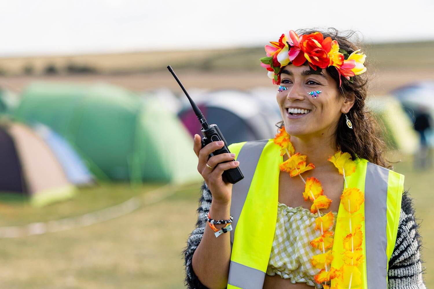 festival health and safety team member on walkie talkie