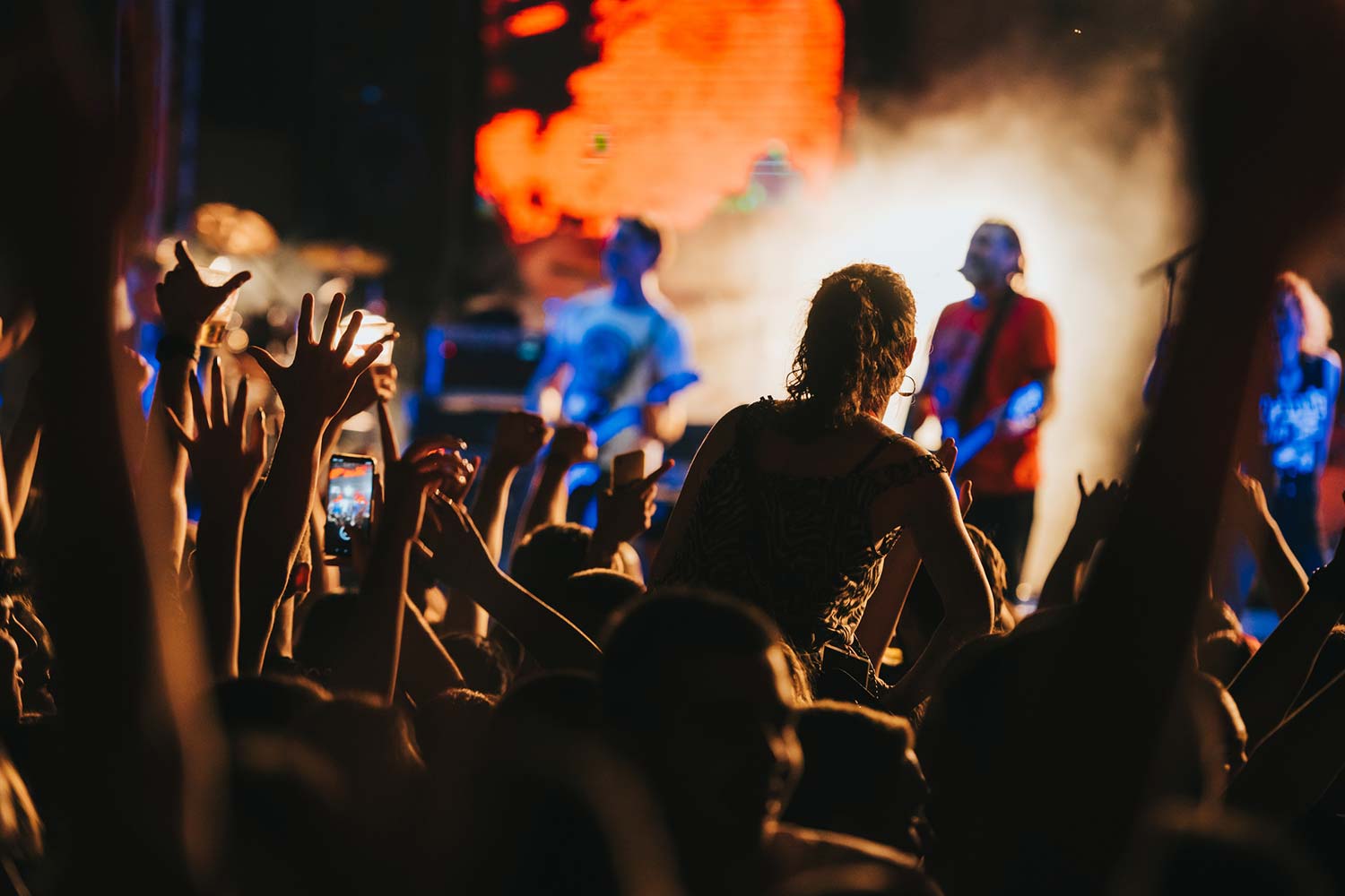 group of people enjoying at intimate gig