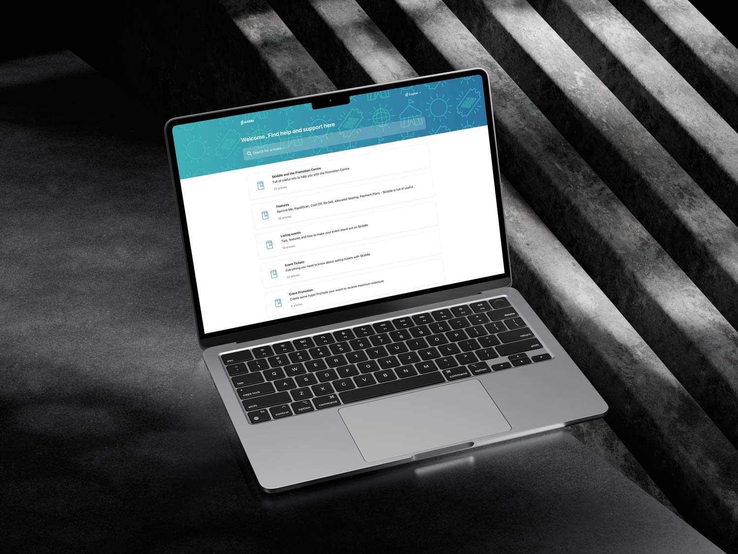 Skiddle help centre on a laptop